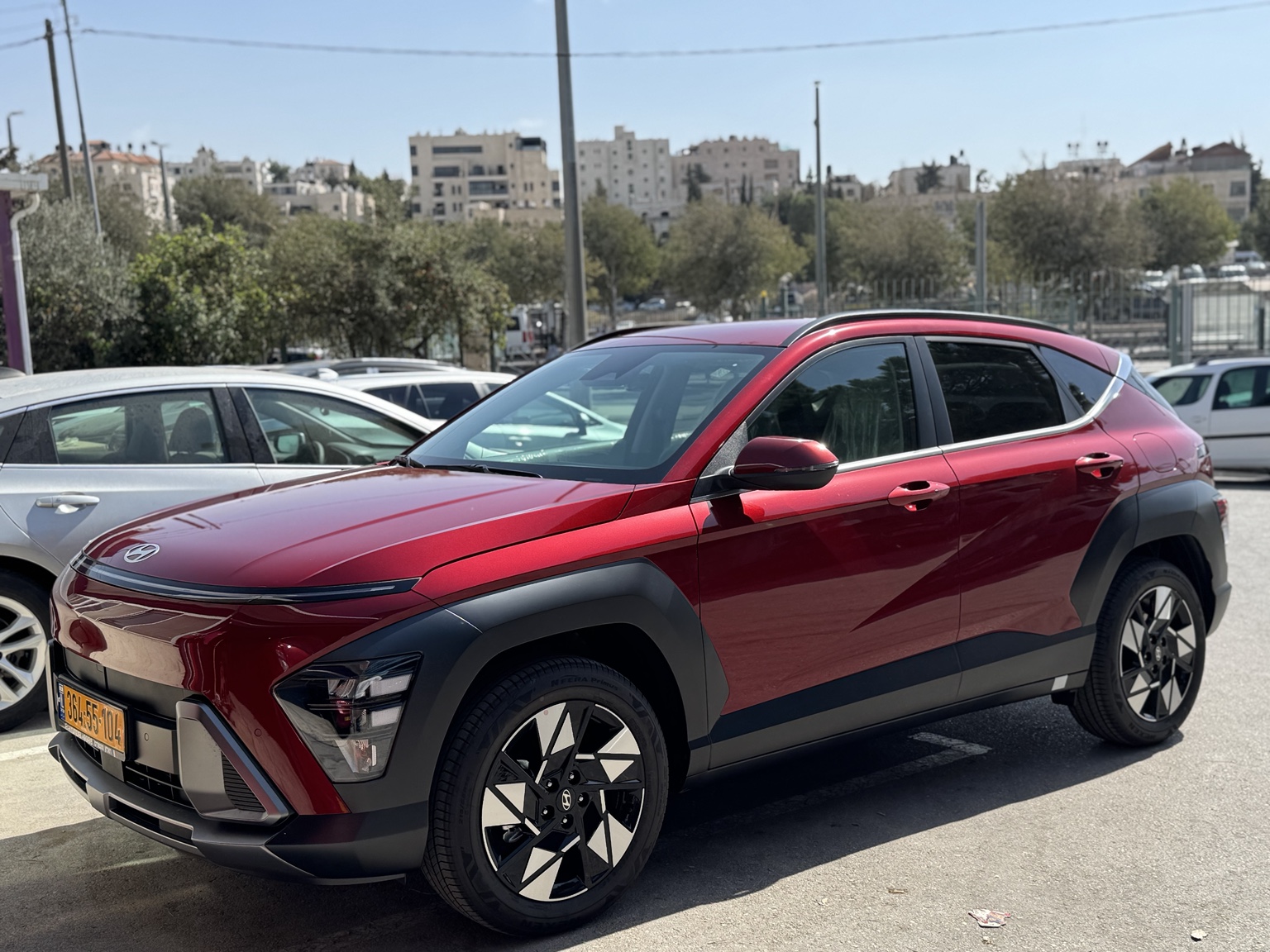 Red Hyundai Kona representing newer Dallah fleet vehicles